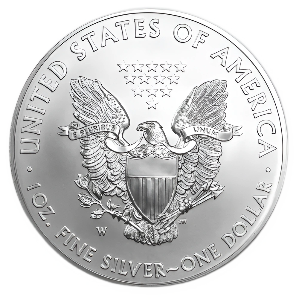  Detailed reverse side of a 1 oz fine silver American Eagle coin featuring a heraldic eagle and stars.