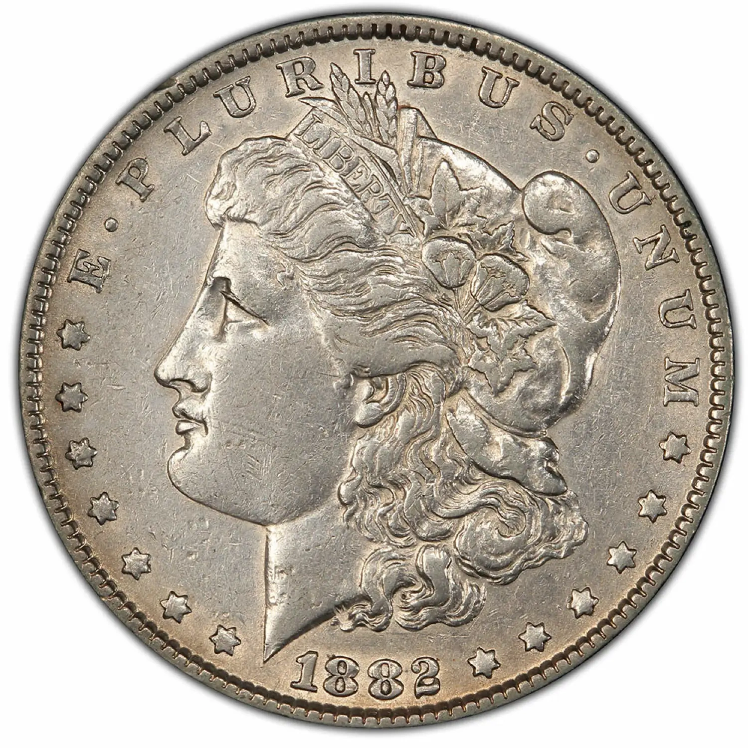 Obverse of an 1882 Morgan silver dollar featuring Lady Liberty and surrounding stars.